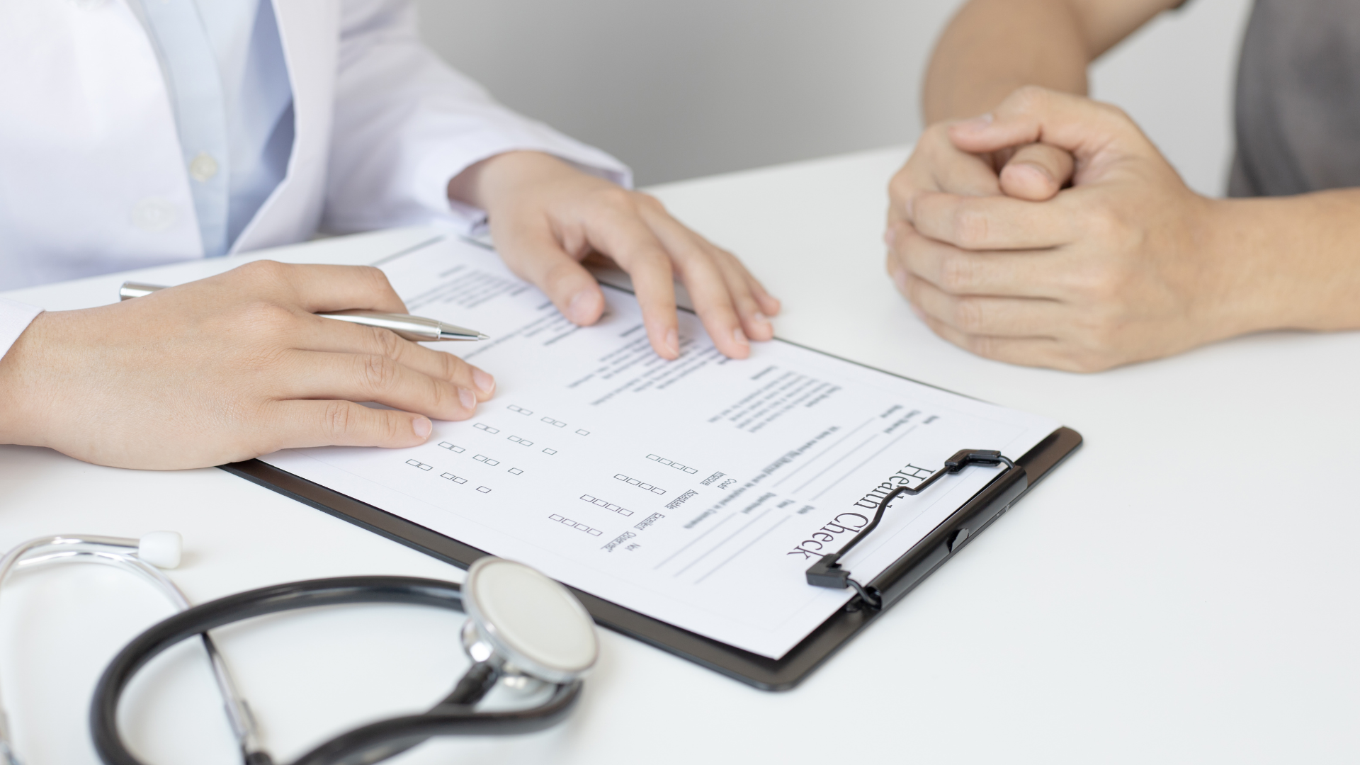 Doctor consulting patient